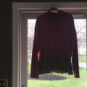 Red tunic top with plaid ruffle